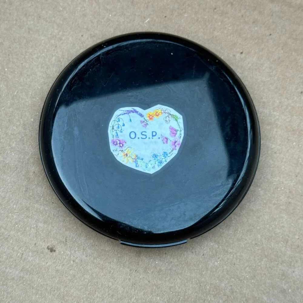 OSP Cosmetics Photochromatic Pressed Powder in Coffeehouse